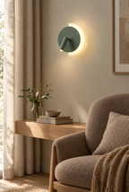 Rund vägglampa med lässpot
