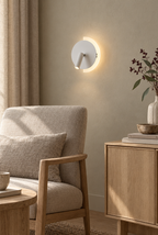 Vägglampa med riktbar lässpot